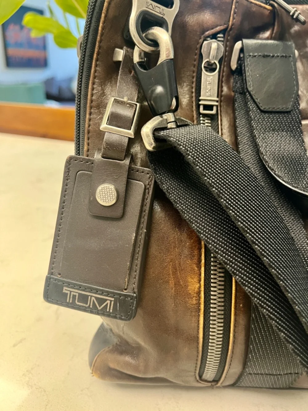 TUMI men's leather briefcase/laptop bag